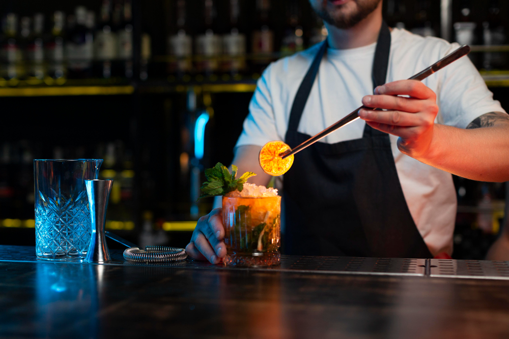 bartender-making-delicious-refreshing-cocktail